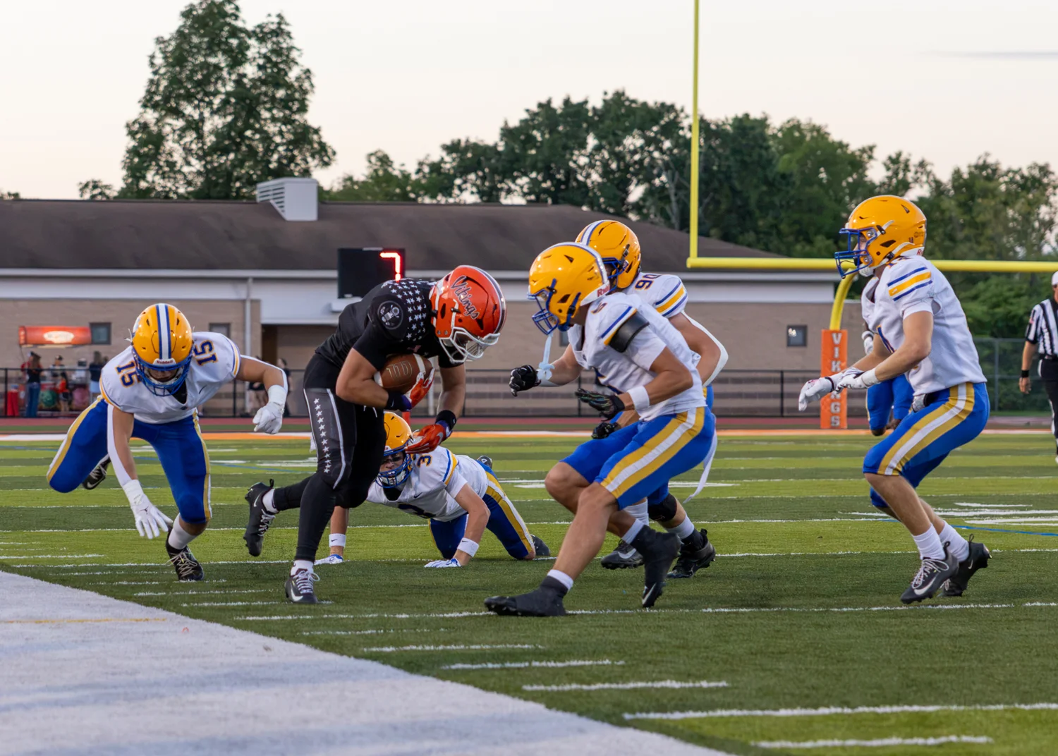 Putting his head down to get through the defense